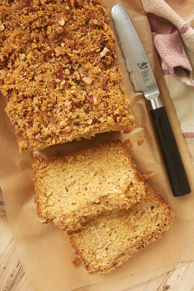 overhead shot of a partially sliced loaf of Ginger Pear Bread