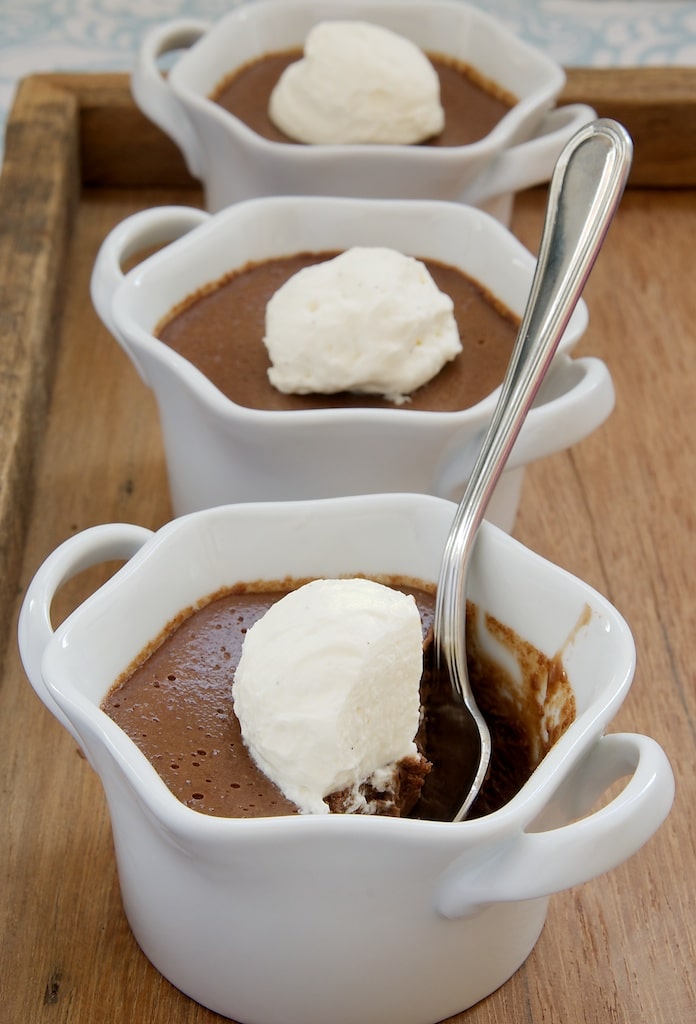 Chocolate Pots de Creme topped with whipped cream