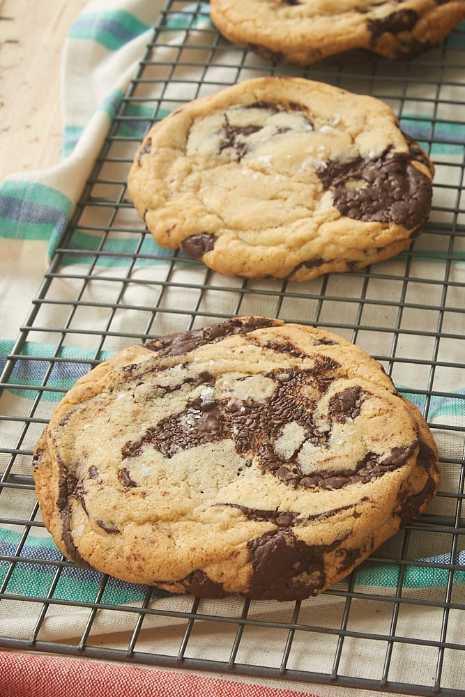 Jacques Torres Chocolate Chip Cookies cooling on a wire rack