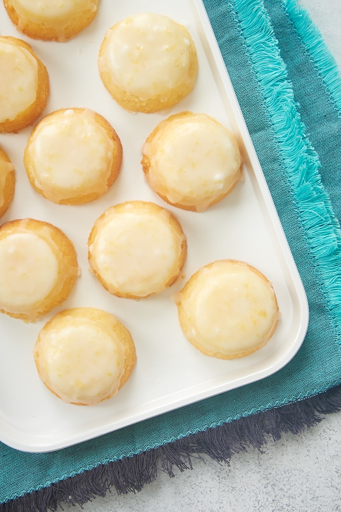 Overhead view of mini pound cakes on a white serving tray