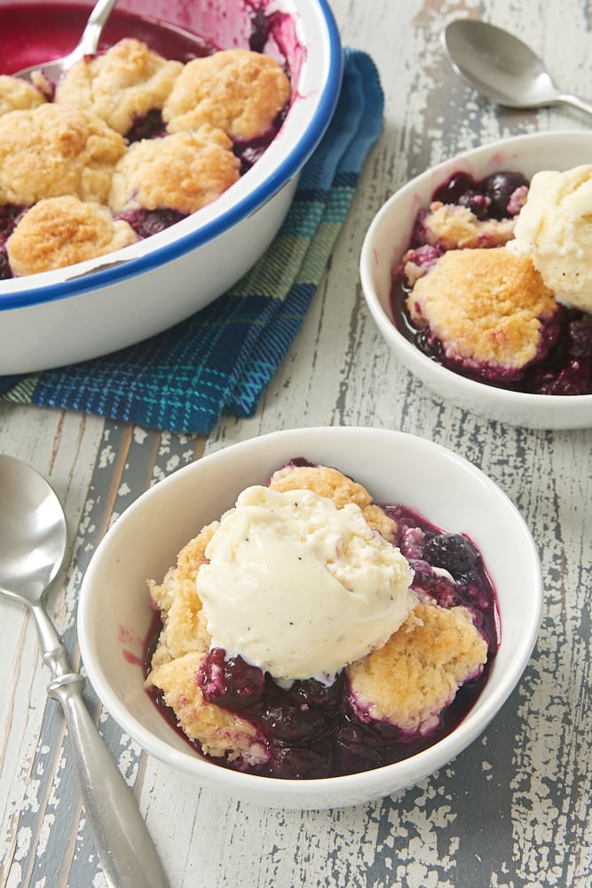 bowls of Blueberry Cobbler with Ginger Biscuits topped with ice cream