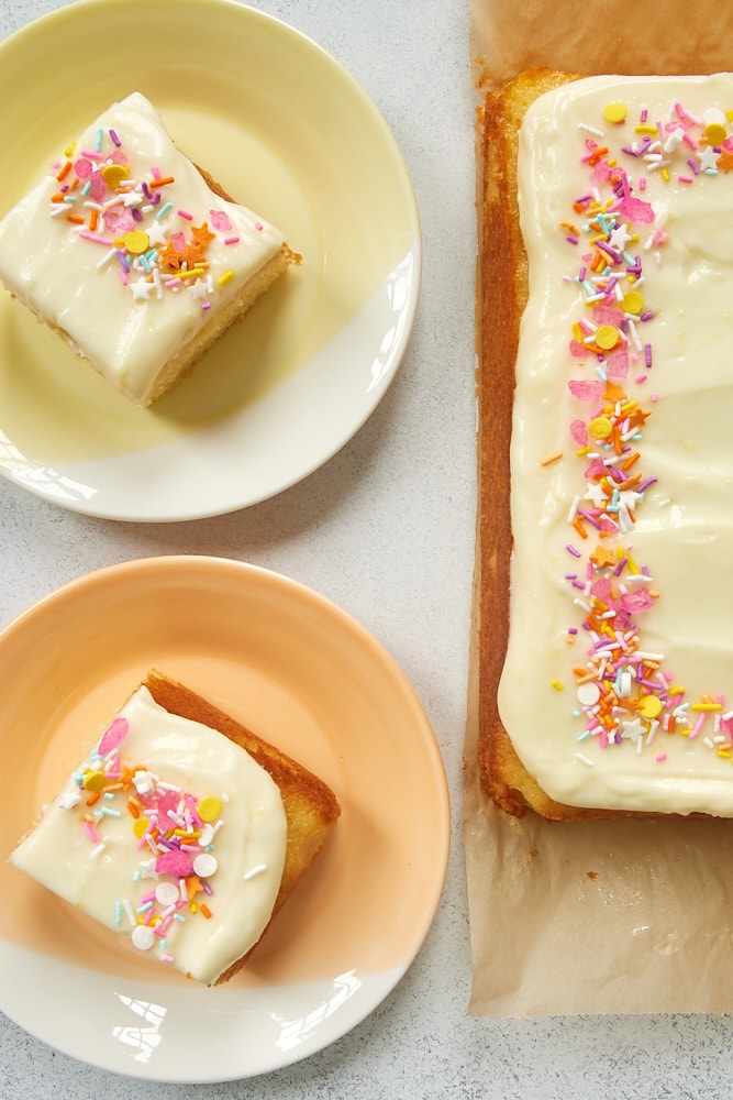 slices of Lemon Sheet Cake on colorful plates