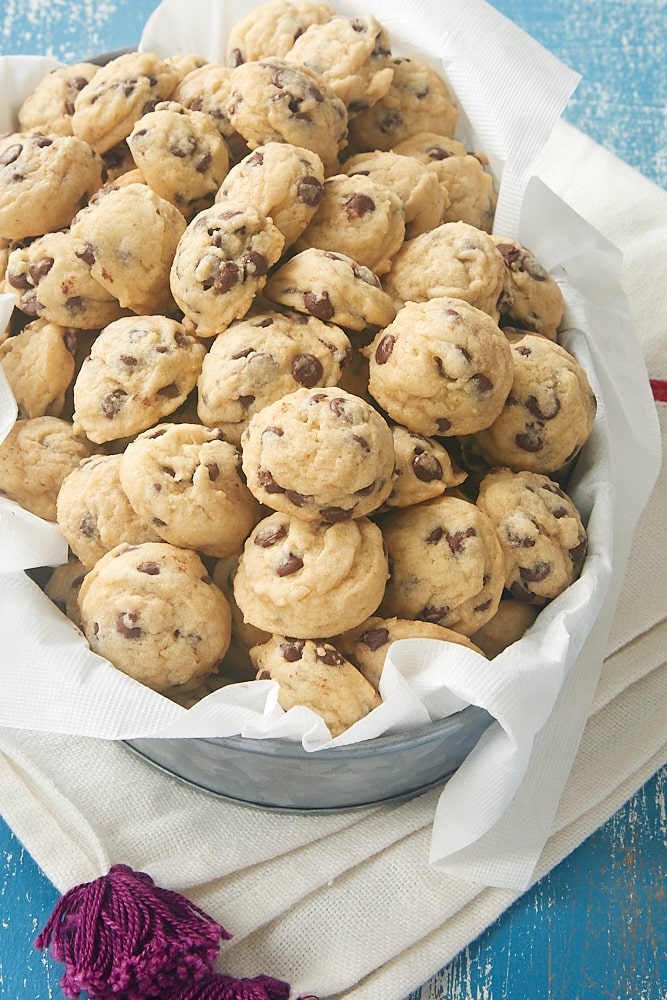 Mini Chocolate Chip Cookies piled into a metal bowl