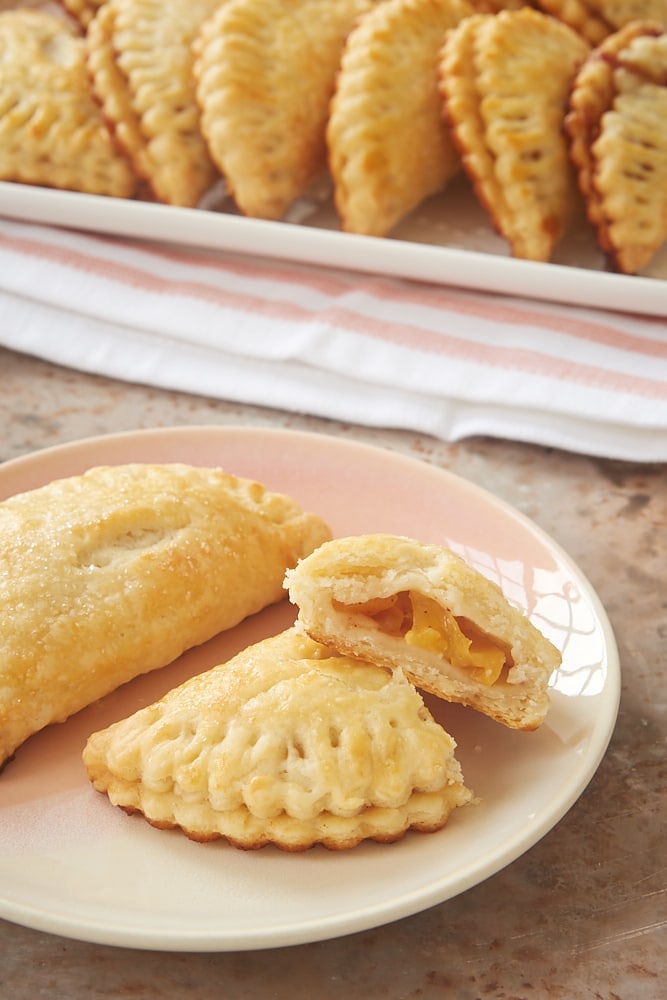 Peach Hand Pies on a light orange plate