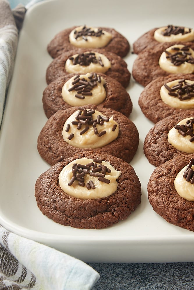 Chocolate Peanut Butter Thumbprint Cookies on a white tray