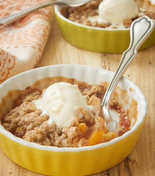 Peach Crumbles for Two topped with ice cream