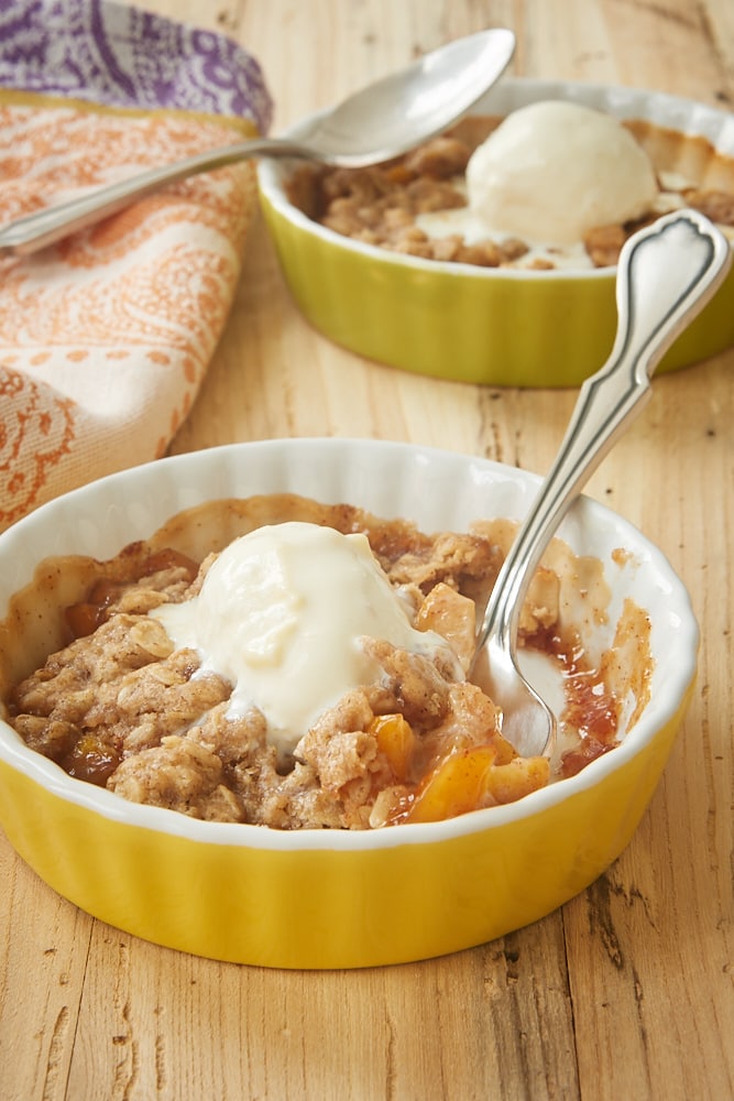 Peach Crumbles for Two topped with ice cream