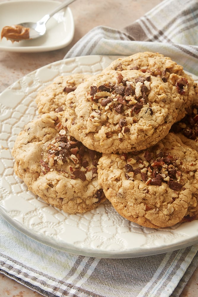 Cookie Butter-Stuffed Oatmeal Cookies stacked on a white plate