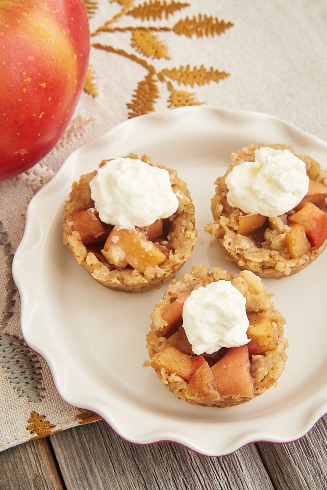 Apple Crisp Bites topped with sweetened whipped cream