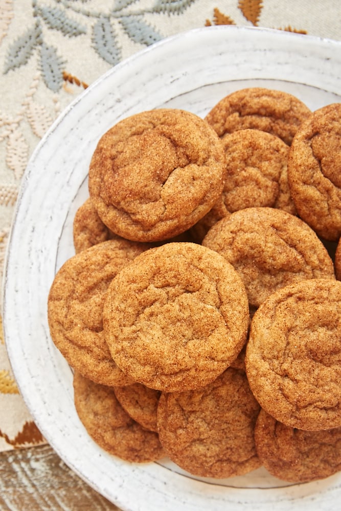 Cookie Butter Snickerdoodles stacked on a white plate