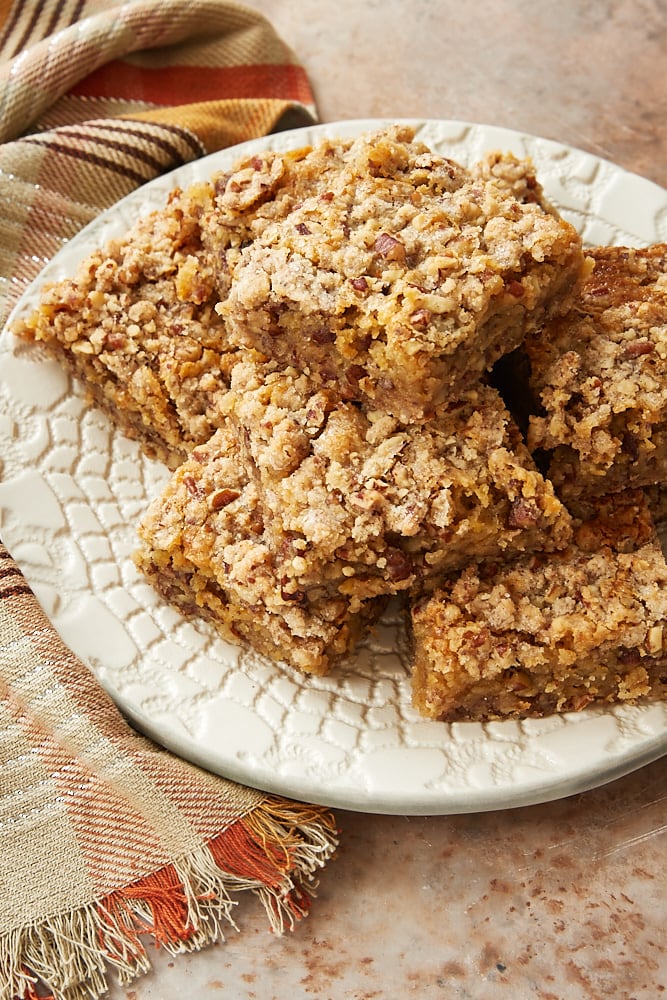 Chewy Pecan Pie Bars stacked on a plate