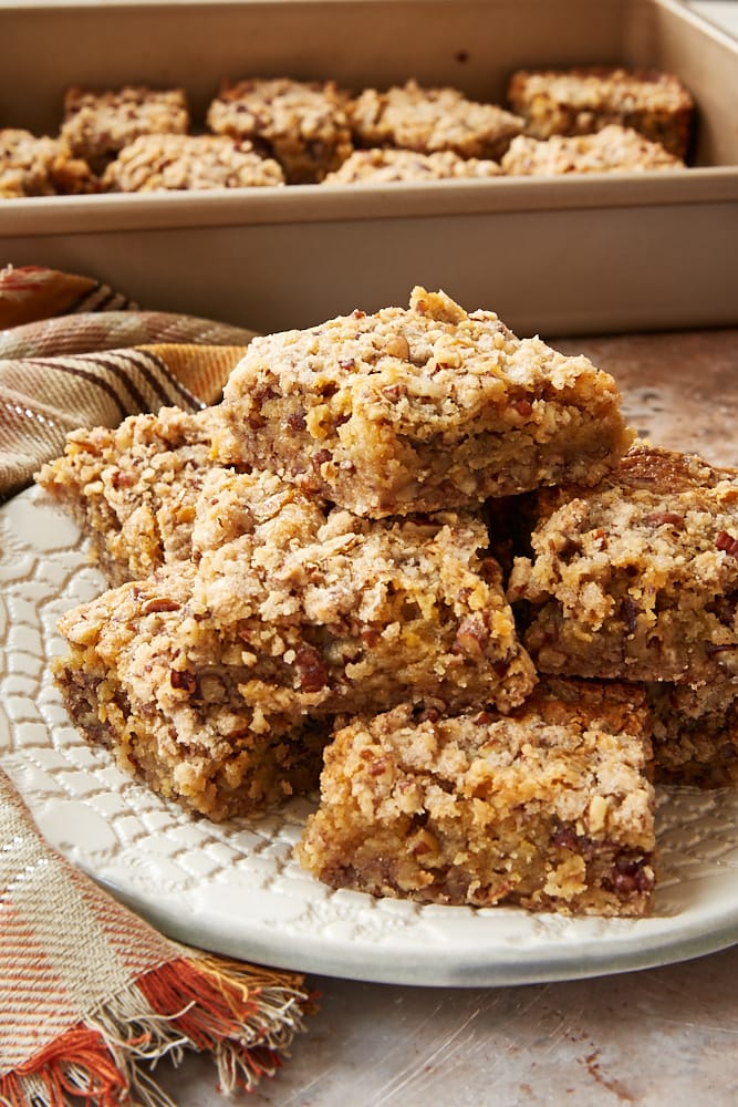 Chewy Pecan Pie Bars served on a ceramic plate