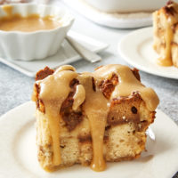 Cookie Butter Pound Cake Bread Pudding topped with a creamy vanilla sauce