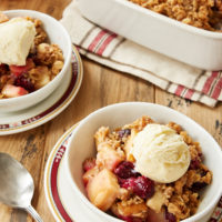 Cranberry Apple Crumble served in white bowls