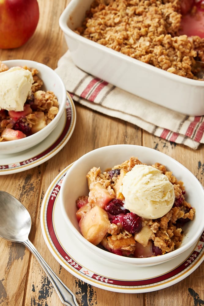 Cranberry Apple Crumble served in white bowls