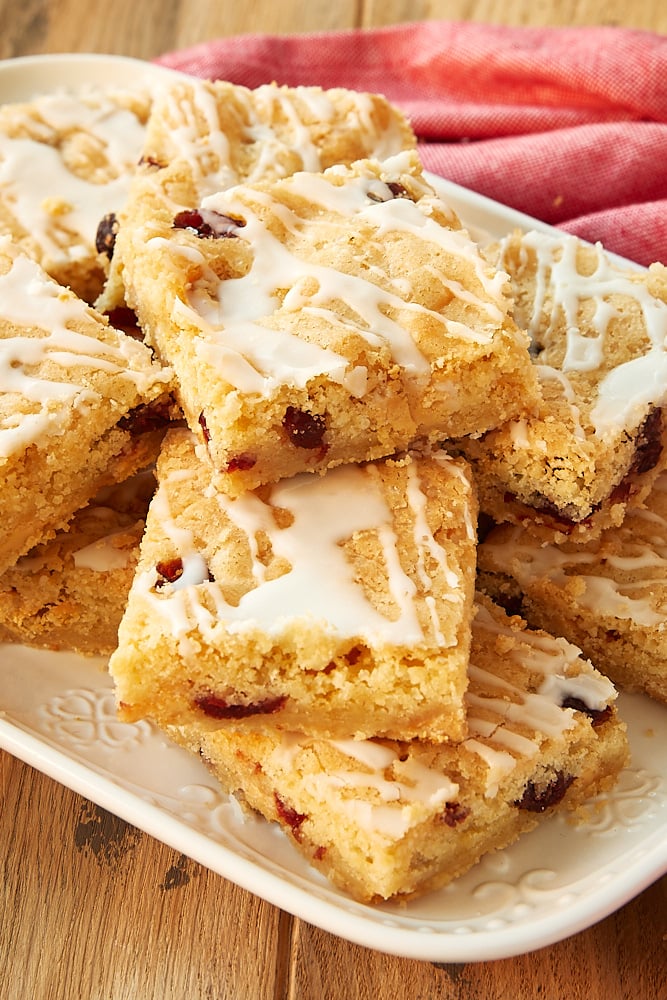 Cranberry White Chocolate Blondies served on a white tray