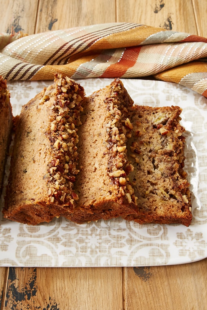 slices of Brown Butter Banana Bread on a patterned tray