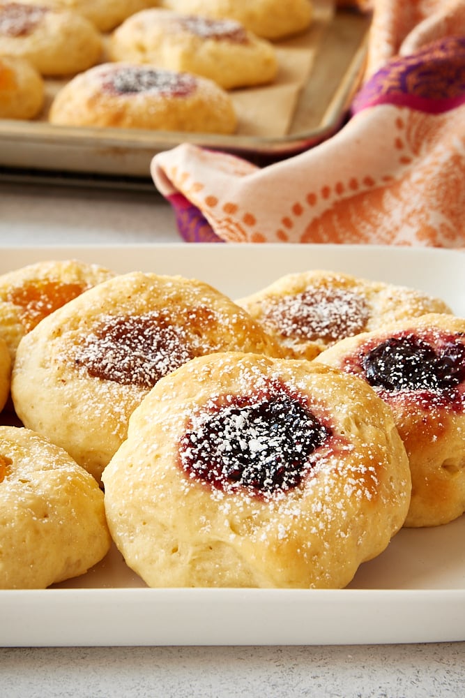 Kolaches with pastry filling and a sprinkling of confectioners' sugar