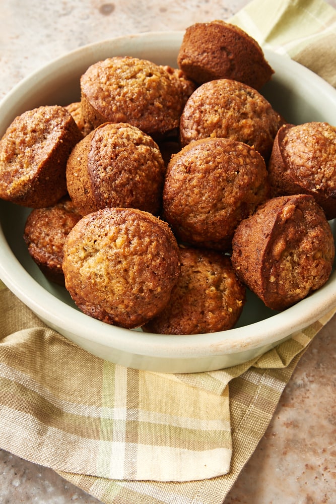 Cookie Butter Banana Muffins in a shallow green dish