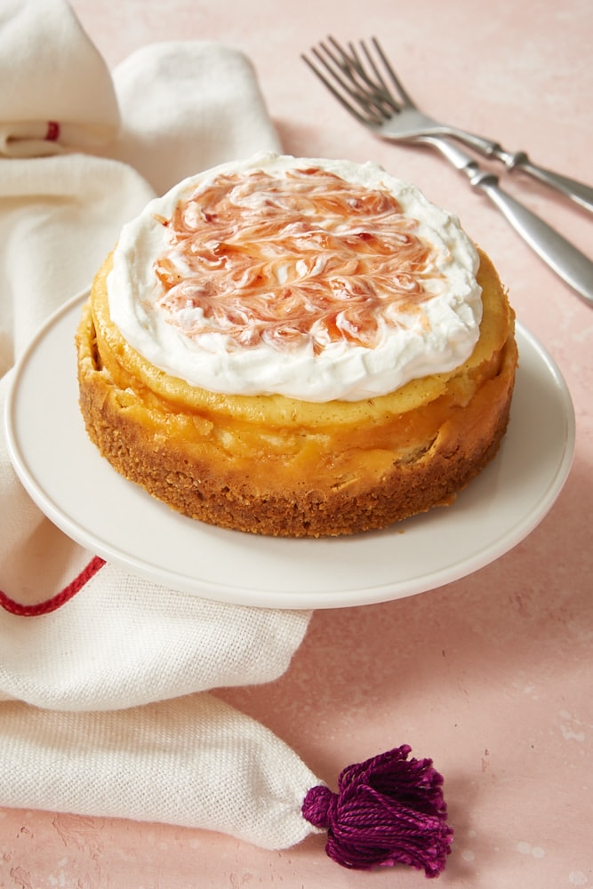Vanilla Bean Cheesecake for Two on a small white pedestal