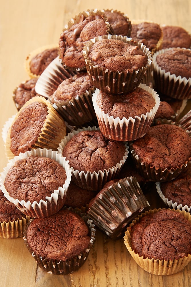 Irish Cream Brownie Bites piled on a wooden surface