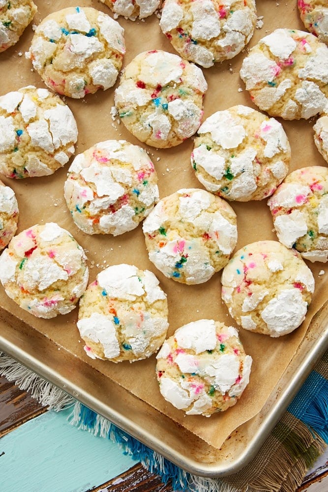 Sprinkle Crinkle Cookies on a parchment-lined baking sheet