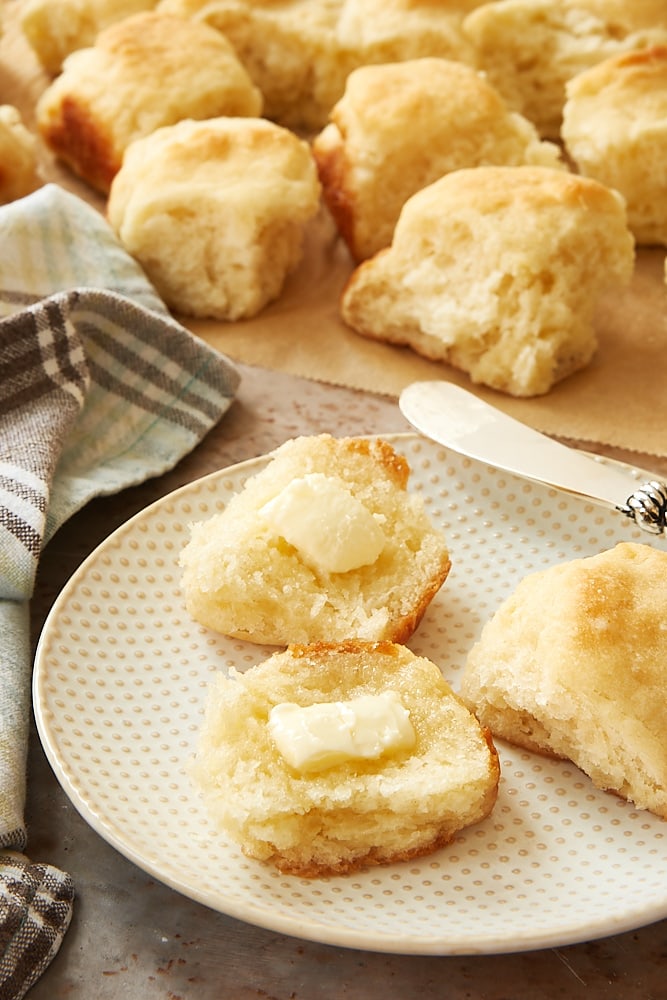 Angel Biscuits split apart and spread with butter