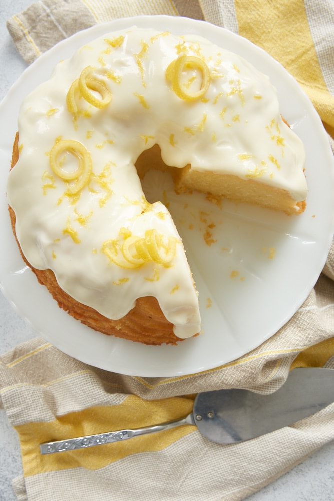 Lemon Bundt Cake topped with lemon curls and zest