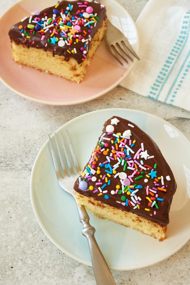 two slices of 6-Inch Yellow Cake on colorful plates