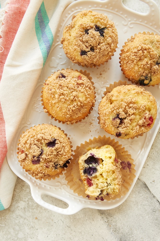 overhead view of Berry Cheesecake Muffins on a white tray