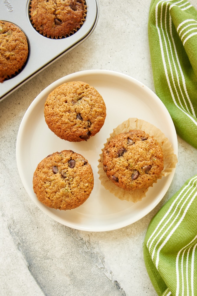 overhead view of Chocolate Chip Zucchini Muffins on a white plate