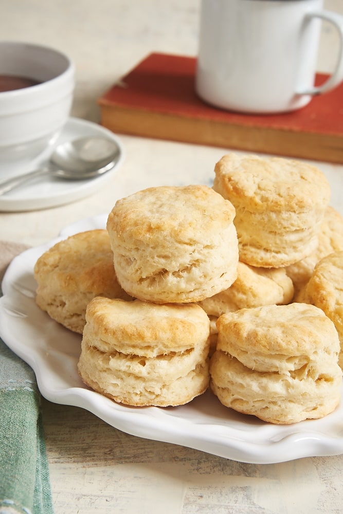 Cream Cheese Biscuits stacked on a white plate