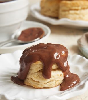 Cream Cheese Biscuits and Chocolate Gravy served on a white plate