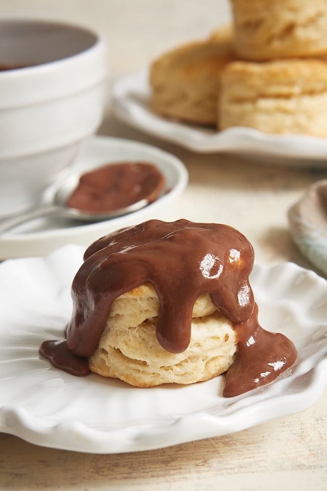 Cream Cheese Biscuits and Chocolate Gravy served on a white plate