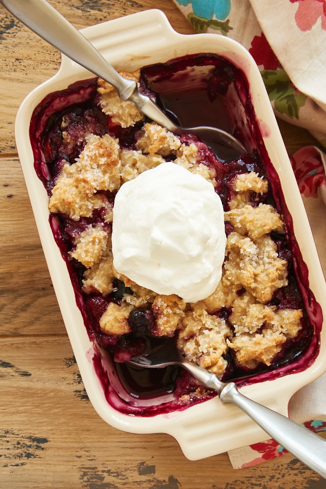 overhead view of Mixed Berry Cream Cheese Crisp with two spoons