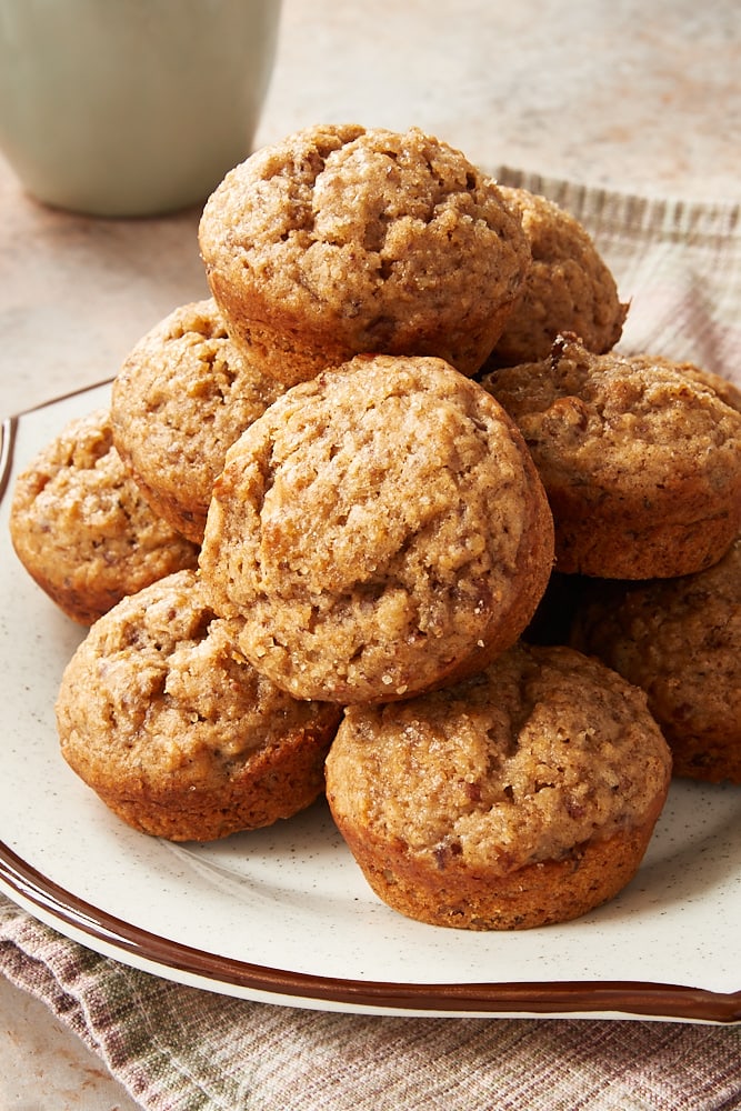 Cinnamon Pecan Muffins on a white and brown speckled plate