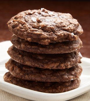 stack of Salted Chocolate Truffle Cookies on a white plate