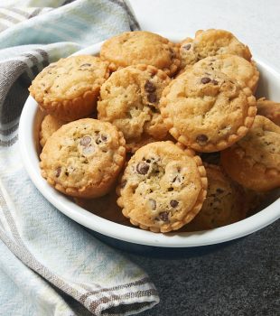 Mini Chocolate Chip Pies in a white-rimmed blue bowl