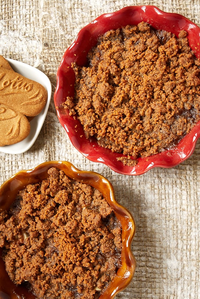 overhead view of Apple Pear Biscoff Crisps in individual baking dishes