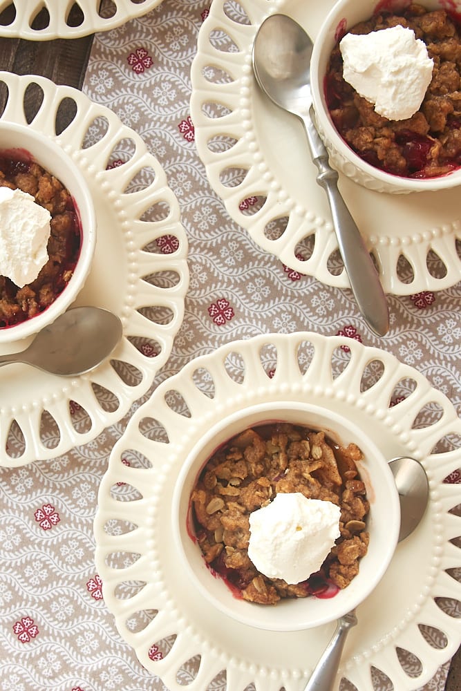 overhead view of Cranberry Pear Crumbles in white ramekins