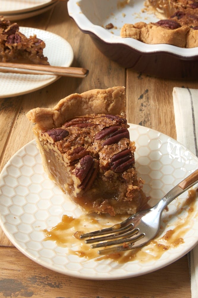 slice of Irish Cream Pecan Pie with a few bites missing