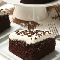 slice of 6-Inch Chocolate Cake with Marshmallow Frosting on a square white plate