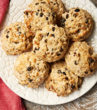 overhead view of Currant Oat Scones on a patterned white plate