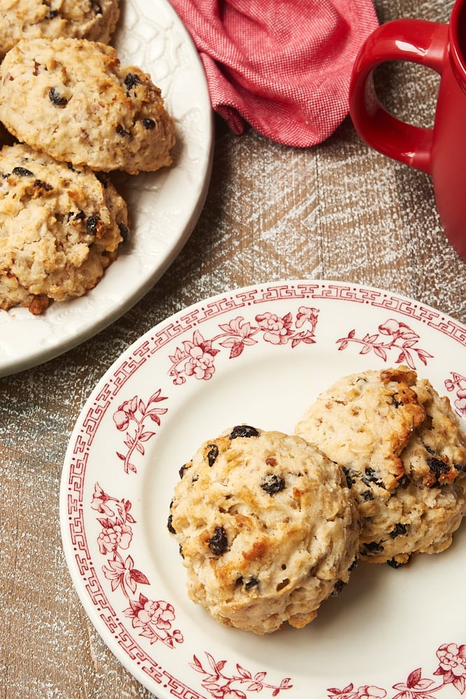 Currant Oat Scones on a red floral-rimmed white plate