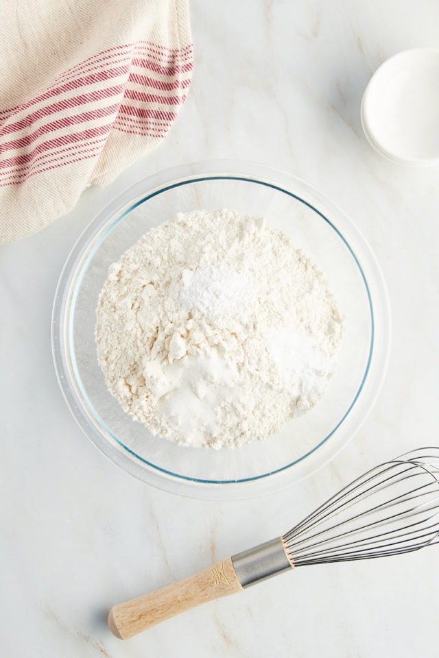 Flour with baking soda and powder in a mixing bowl.