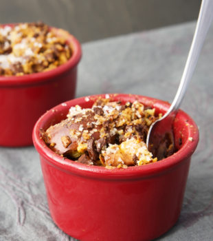 Dark Chocolate Bourbon Bread Puddings in red ramekins