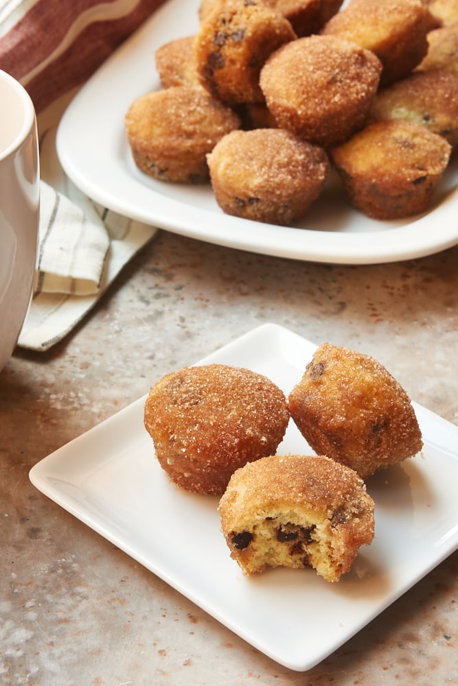 Mini Chocolate Chip Doughnut Muffins on a square white plate