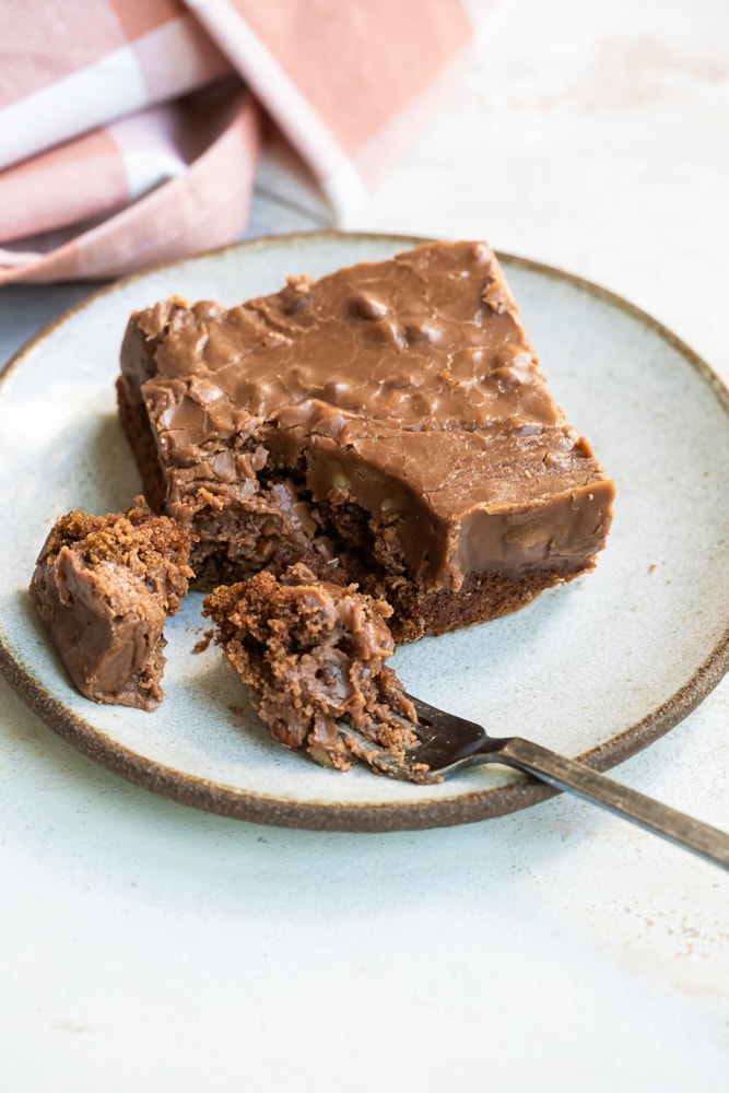 slice of Old-Fashioned Chocolate Cake on a beige plate