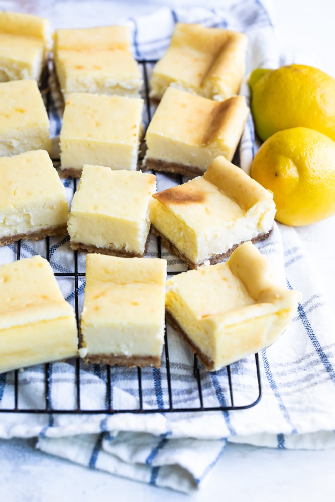 Limoncello Cheesecake Squares on a wire rack