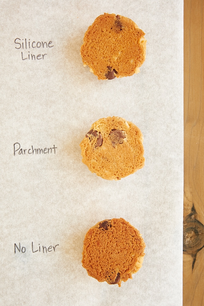 overhead view of the bottoms of cookies baked on lined or unlined baking sheets